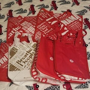 6 Bags Lululemon reusable Red and White Bags.